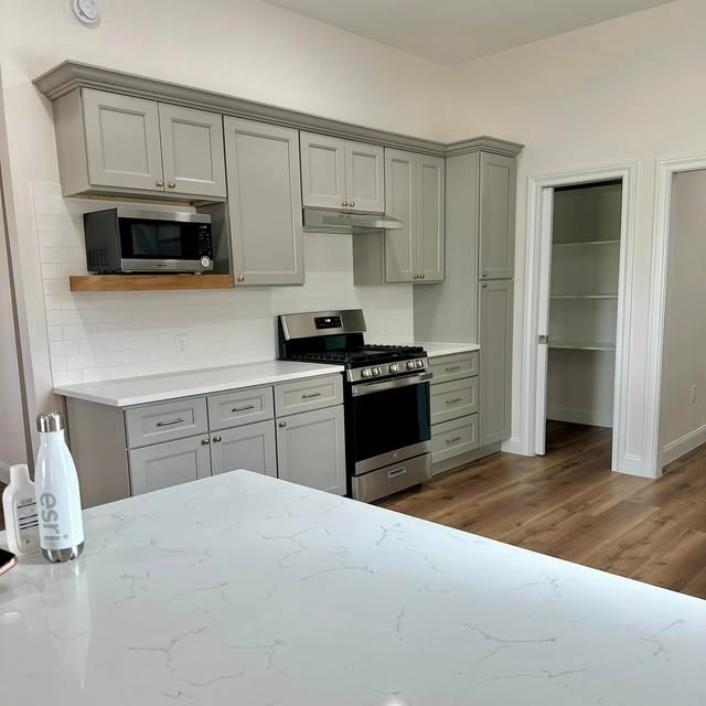 Quartz counters & wood floor